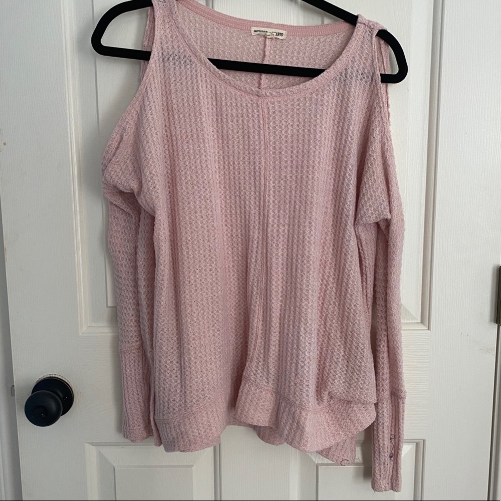 pink top with cut out shoulder